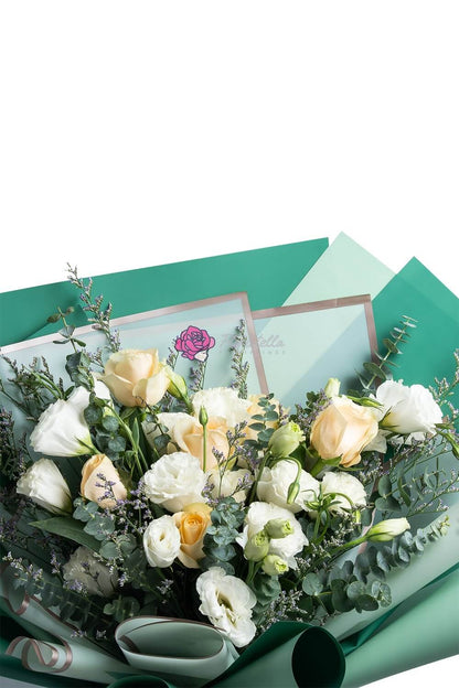 Evergreen flower arrangement for delivery to loved ones in the Philippines.