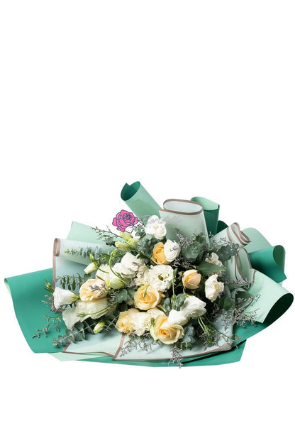 Evergreen flower arrangement for delivery to loved ones in the Philippines.